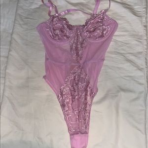 Light pink Lace and mesh body suit with adjustable straps